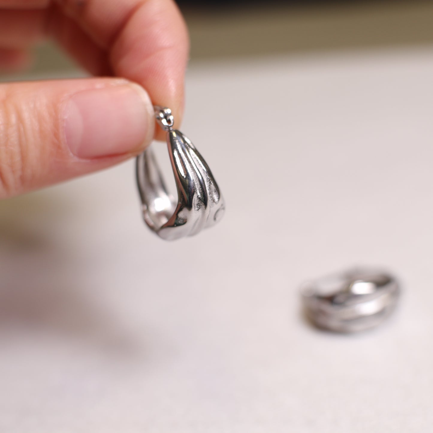 E0018 Small hammered basket earrings